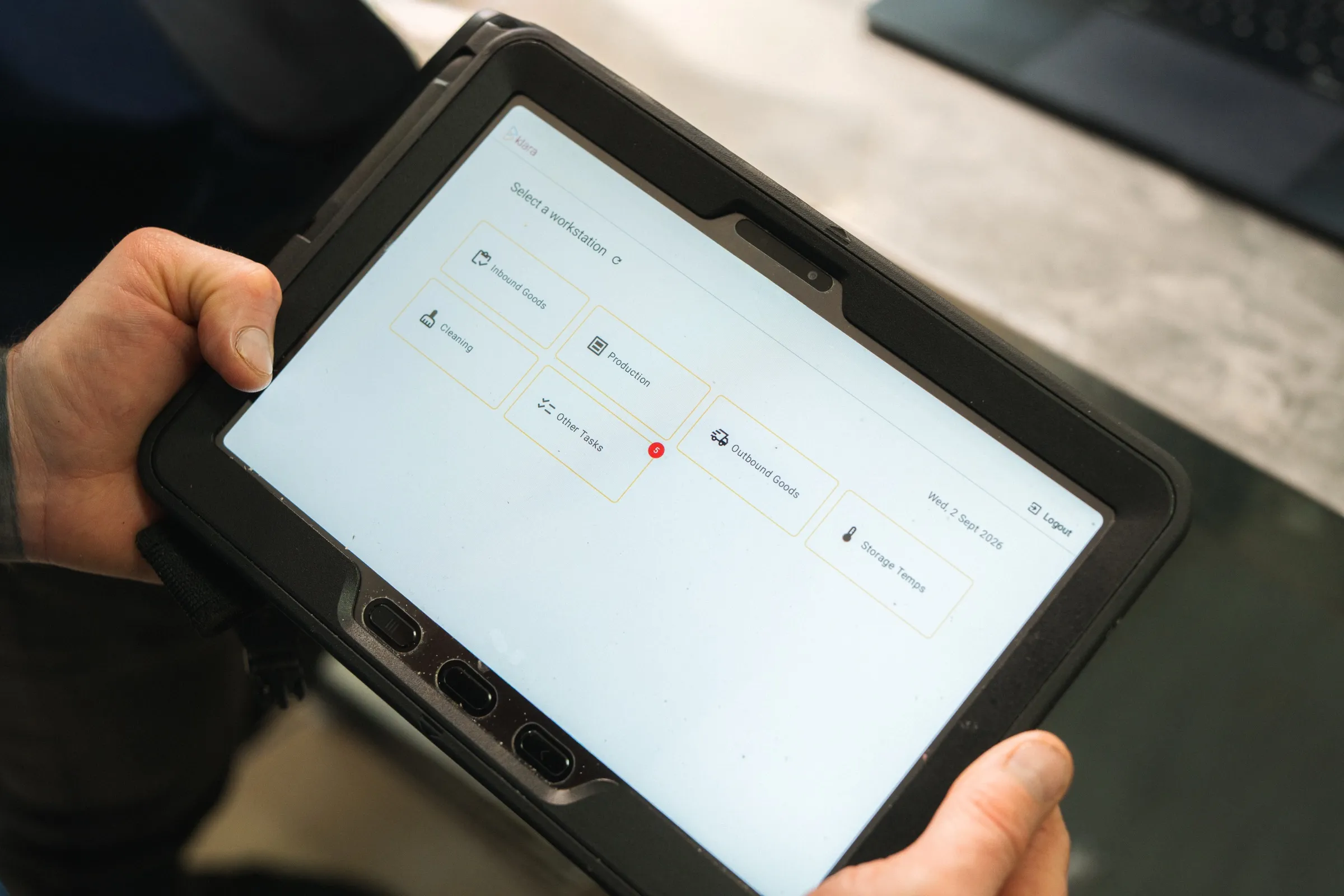 The Klara tablet home screen, showing the workstations at Mayfair Bakery